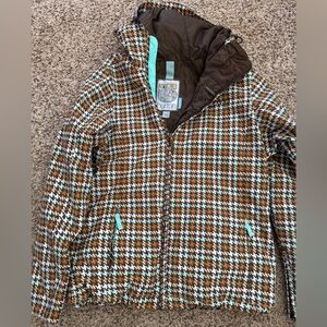 Women’s Burton ski/ snowboarding jacket in new condition size medium